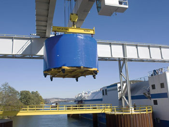 A segment of the upper stage Ares I-X rocket assembled at the NASA Glenn Research Center near Sandusky is transported by a special crane to the cargo hold of the Delta Mariner. Twelve segments were shipped down the Ohio and Mississippi Rivers to the Kennedy Space Center in Florida, in preparation for a test launch in 2009.
Photo courtesy of NASA Glenn Research Center