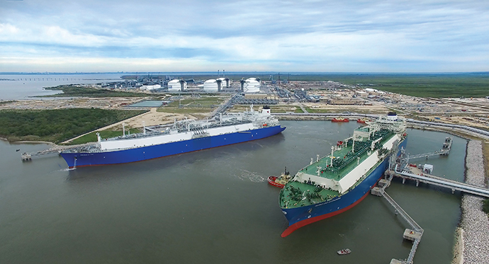 Two tankers take on liquefied natural gas at Cheniere Energy’s ground-breaking LNG export terminal, built on 1,000 acres along the Texas-Louisiana border.