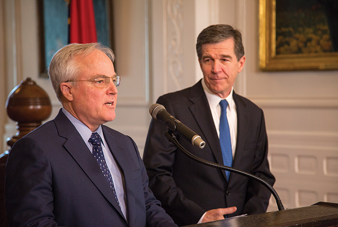 North Carolina Commerce Secretary Anthony M. Copeland (left) and Gov. Roy Cooper