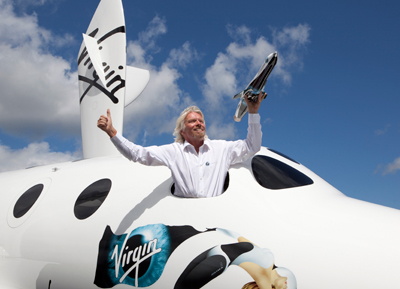 sir-richard-branson-in-spaceshiptwo-holding-model-of-launcherone