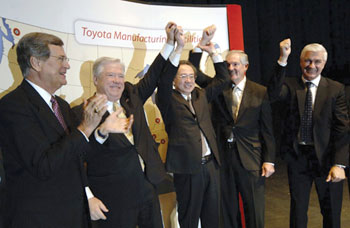 Miss. Sen. Trent Lott, Gov. Haley Barbour and Toyota executives