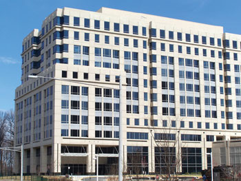 Hilton Hotels Corp. will move its global headquarters into approximately one-third of the Park Place II building in the Tysons Corner area of McLean, Va., in Fairfax County.